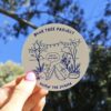 A vibrant sticker depicting a kangaroo standing beside a tent under a sky filled with stylised blue trees in an Australian outback setting. The scene is designed to raise awareness for the Blue Tree Project, a mental health initiative that began in Western Australia and has grown into a global movement.