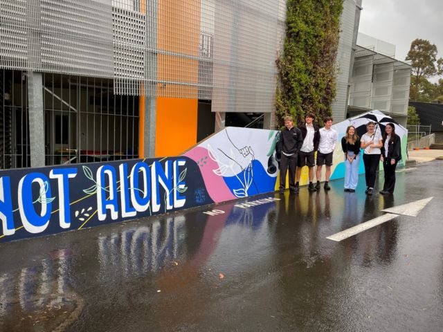 We visited Manea Senior College where the last mural as part of the ‘School Mural Project’ was painted by @imogenpalmer_art thanks to our partnership with @higgins_coatings . ⁠
⁠
Our CEO Kendall spoke with all year 10 and 11 students to share more on the project and ways we can help kick the stigma of mental health. It was awesome to hear that Manea is introducing cohort wide Student Mental Health First Aid training - something that will no doubt stay with them beyond the school yard. 💙⁠