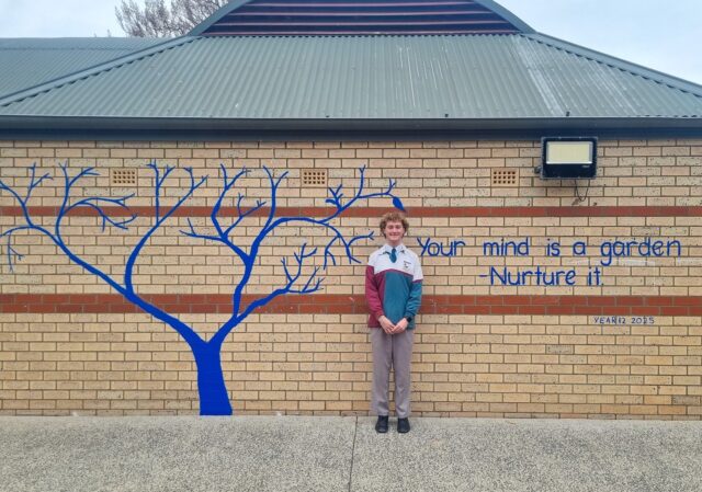 Meet Angus, a Year 12 student at Carrol College standing with the blue tree mural and quietly shaping the culture of mental health around him.

This blue tree is such a good reminder that schools are more than classrooms. They are places where young minds grow, and what is encouraged and nurtured in those spaces really helps shape who we become.

Thanks to Mrs Shilling, Ms Richards and the senior students for coming together to create this everyday reminder to check-in and look out for one another.

📍 Carroll College, Broulee NSW